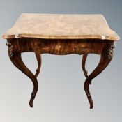 A 19th century walnut occasional table