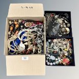 Three boxes of a large quantity of costume jewellery,