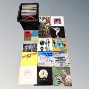 A crate of vinyl records to include Queen, Deep Purple, Ian Drury, Elvis Costello, David Bowie,