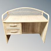 A contemporary bamboo and wicker dressing table fitted with two drawers