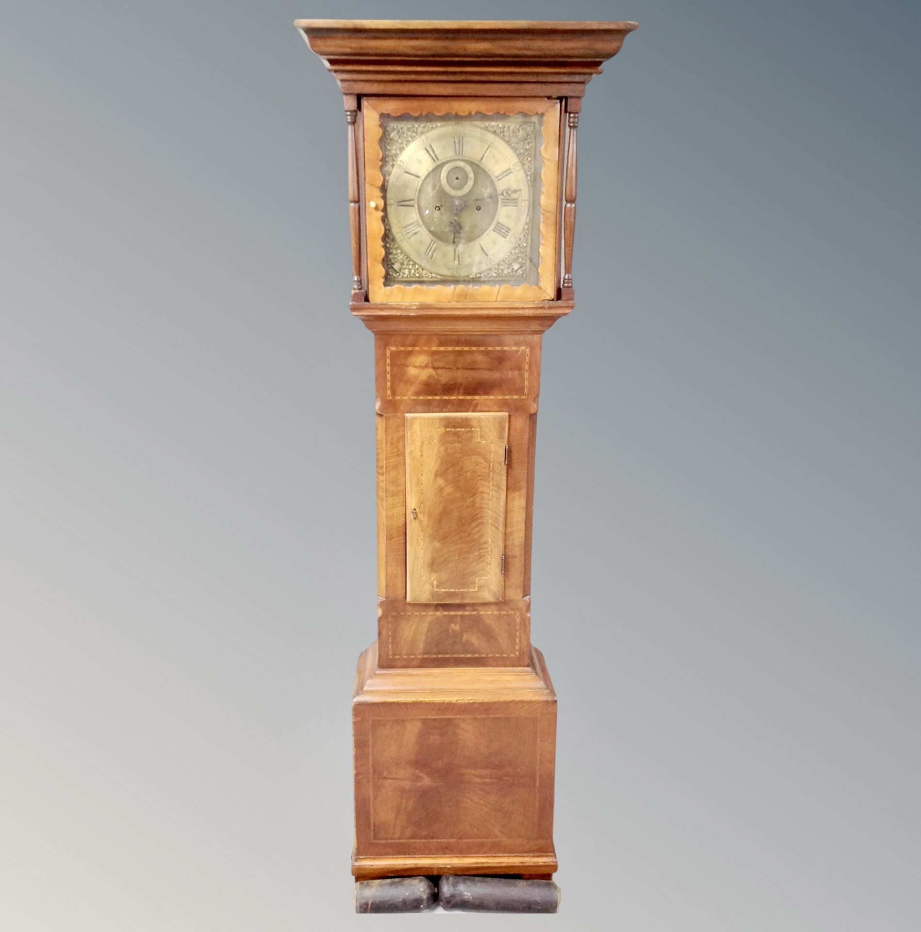 A 19th century inlaid mahogany longcase clock with brass dial,