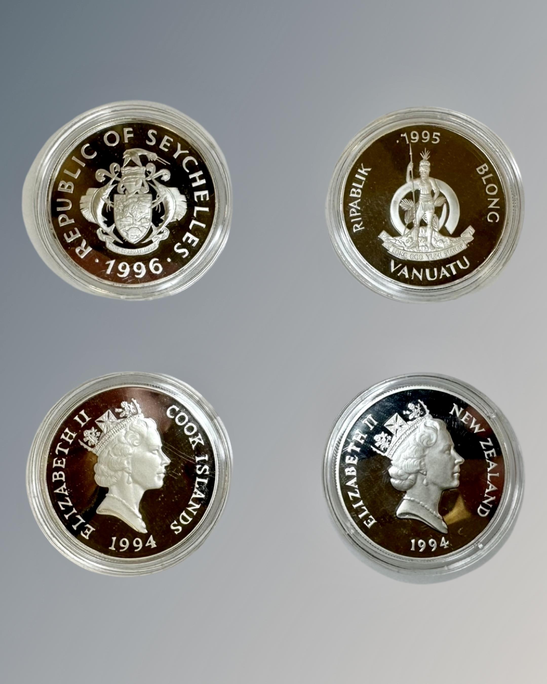 Four silver proof crown size silver coins, Seychelles, Cook Islands, Vanuatu and New Zealand.