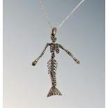 A silver skeleton chain