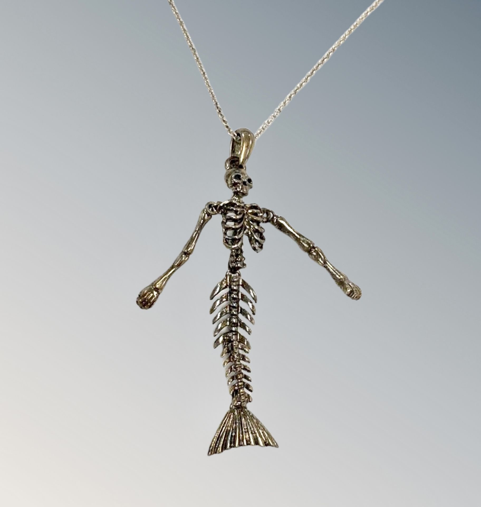 A silver skeleton chain