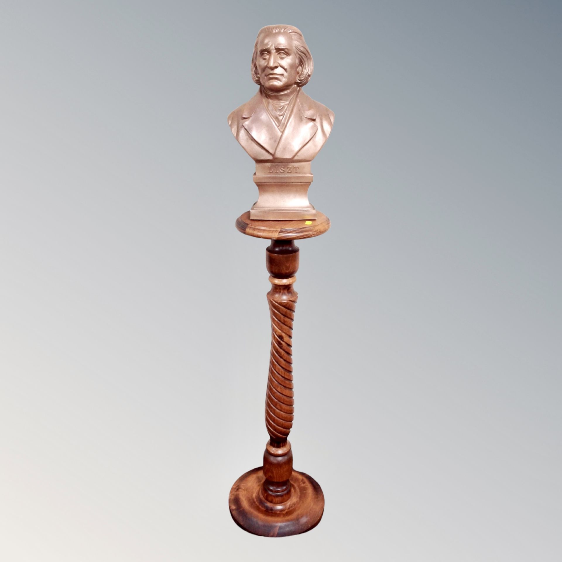 A contemporary bust of Franz Liszt on a beech pedestal