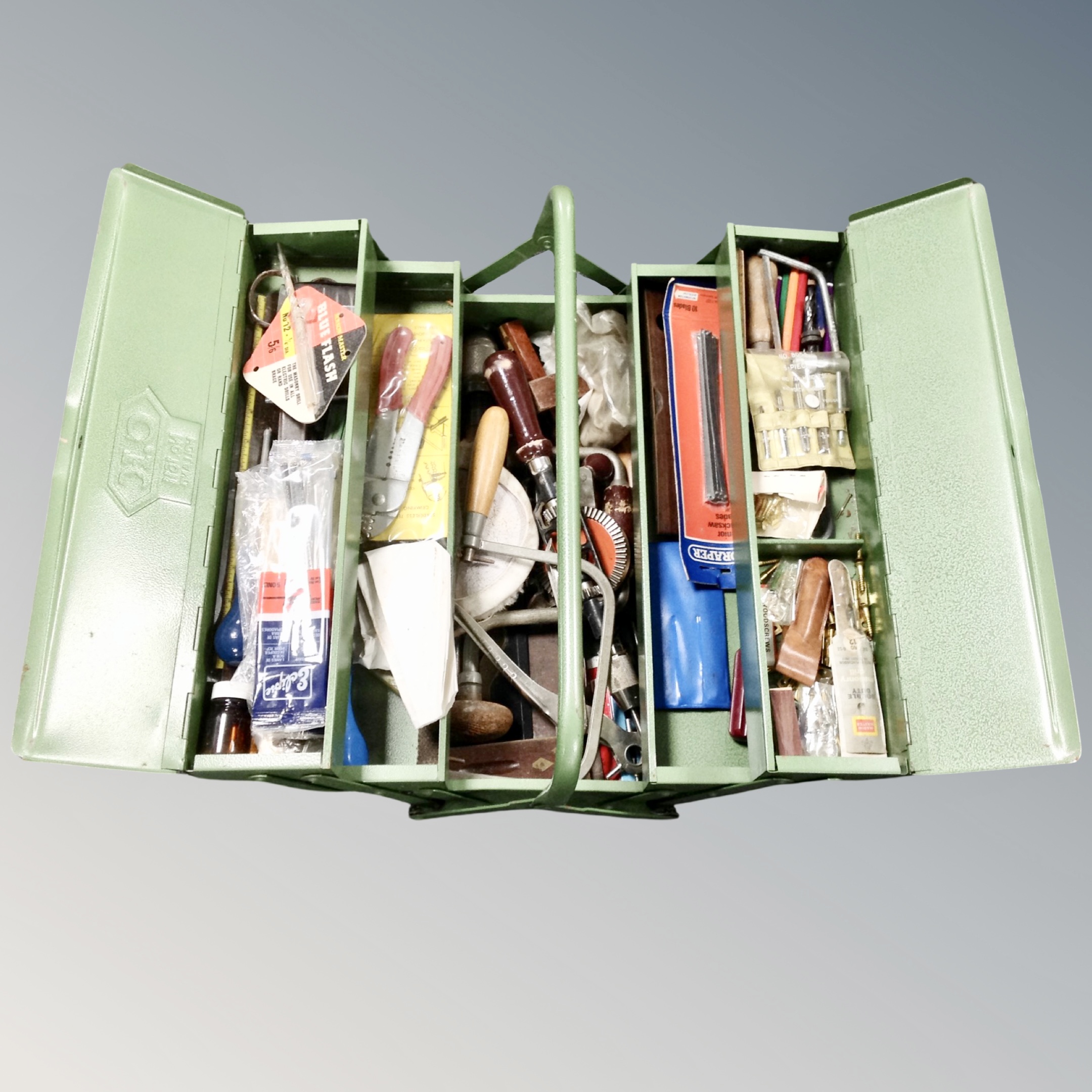 A metal concertina tool box containing hand tools