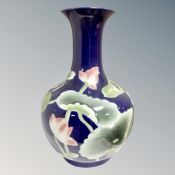 A glazed ceramic bulbous floor standing vase,