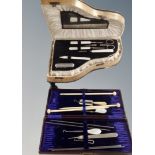 Two cased manicure sets, one in the form of a grand piano.