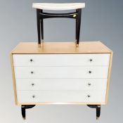 A four-piece mid century G-Plan E Gomme bedroom suite comprising of four drawer chest,
