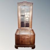 A 19th century inlaid mahogany cabinet on stand