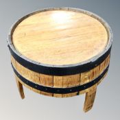An oak coopered barrel coffee table