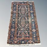 An antique Caucasian rug, circa 1900,