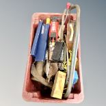 A large plastic crate of vintage and later tools, pullies, hand saws, draughstman's ruler,