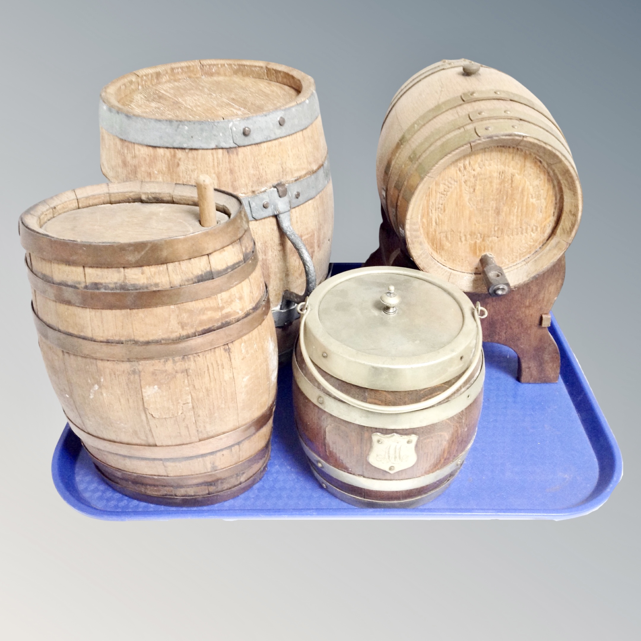 A tray of three vintage oak coopered barrels, one on stand,