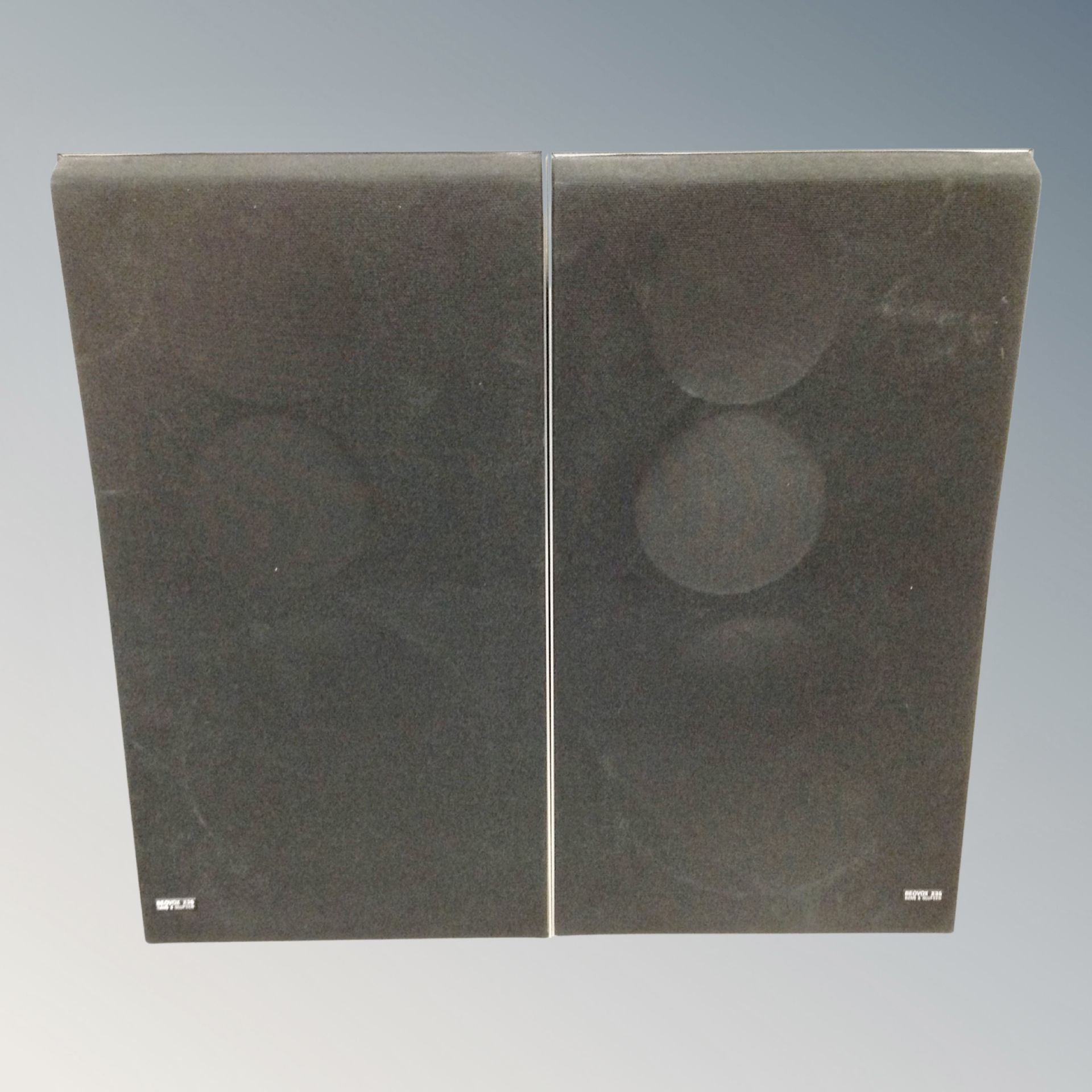 A pair of Bang & Olufsen Beovox X35 speakers