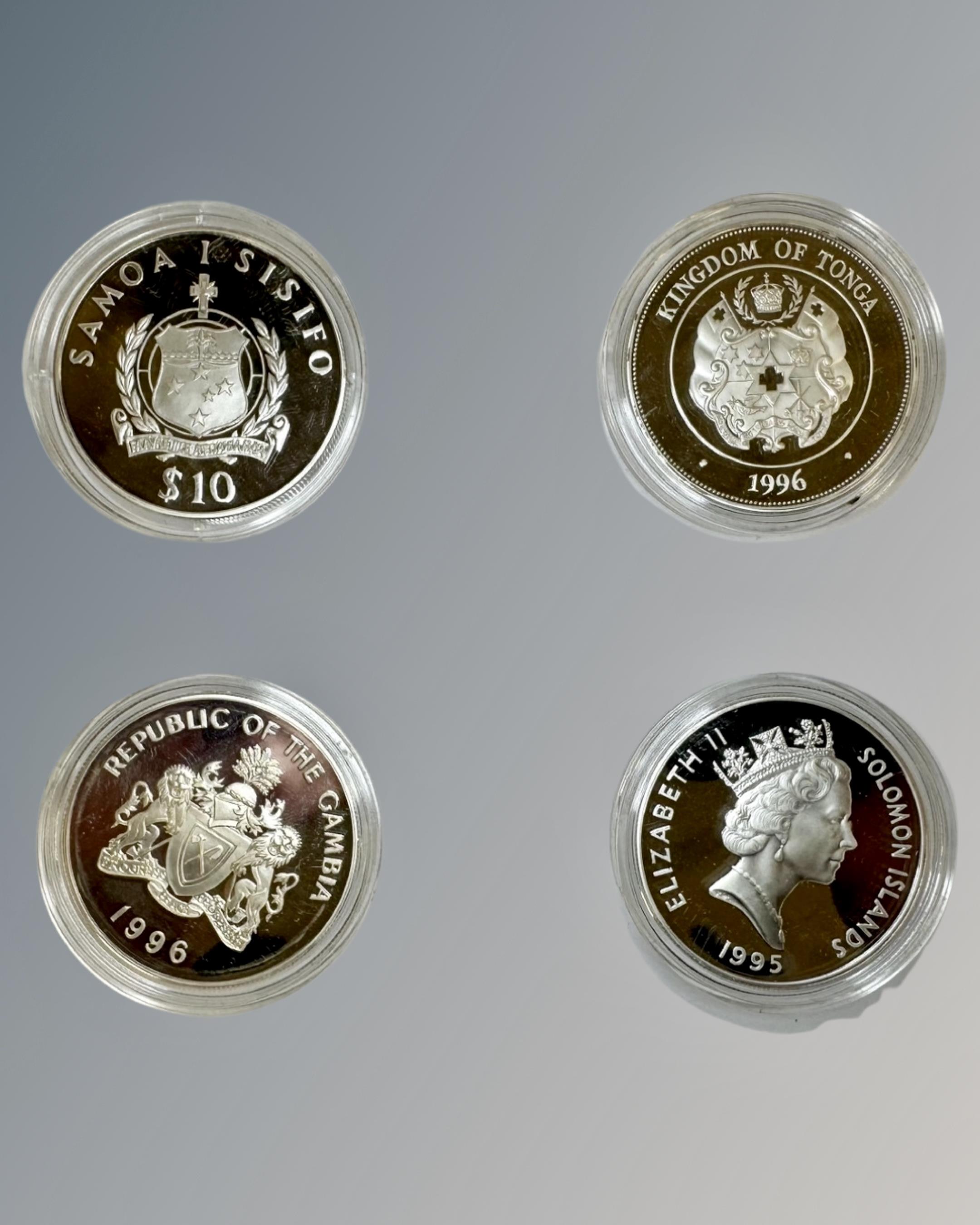 Four silver proof crown size coins, each weighing 31.3 to 31.