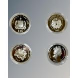 Four silver proof crown size coins, each weighing 31.3 to 31.