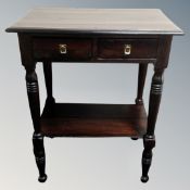 An antique style two-drawer side table