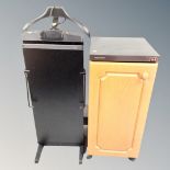A Morphy Richards food warming cabinet together with a trouser press