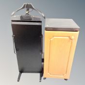 A Morphy Richards food warming cabinet together with a trouser press