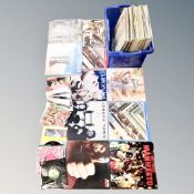A box of vinyl LPs and 7" singles to include Wings, The Beatles, Roxy Music, John Lennon,