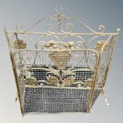 A wrought iron gilt fire screen together with a further antique folding spark guard
