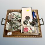 An Edwardian oak twin handled tray containing vintage hand-painted lead aircraft, pocket compasses,