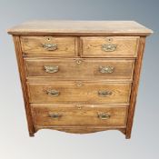 A late Victorian oak five drawer chest