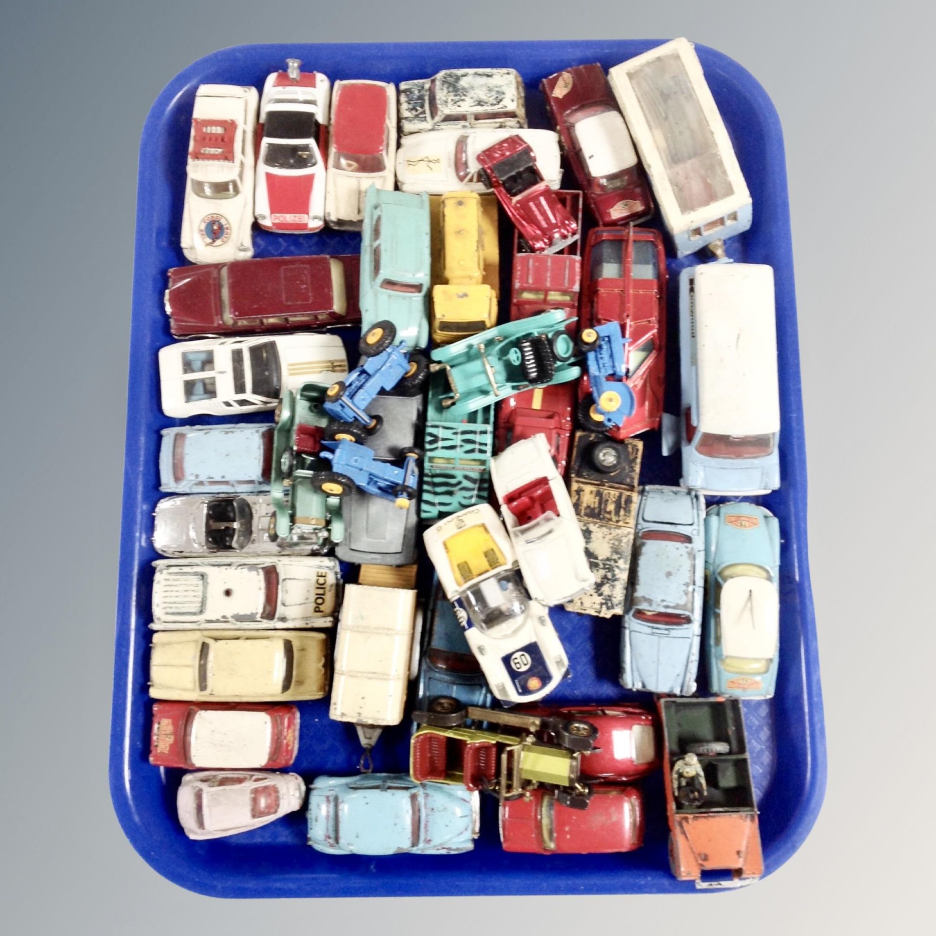 A tray of mid century and later play worn die cast vehicles, Dinky, Corgi, Lesney,