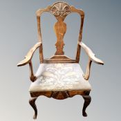 A 19th century elm and beech armchair with tapestry seat