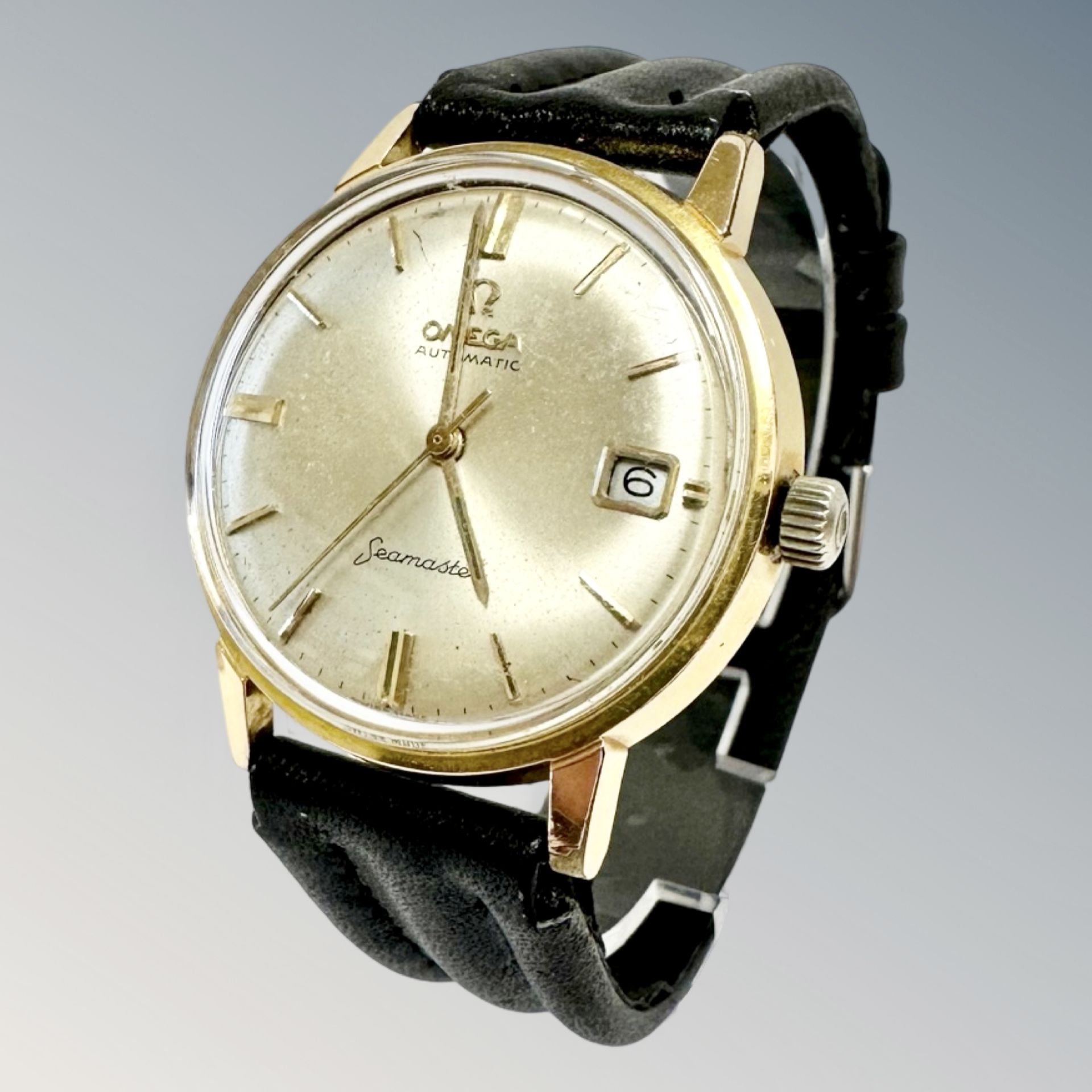 A gent's gold plated and stainless steel Omega wristwatch with replacement Omega dial.