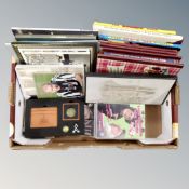 A box containing Newcastle United memorabilia, photograph books, Newspaper cuttings,