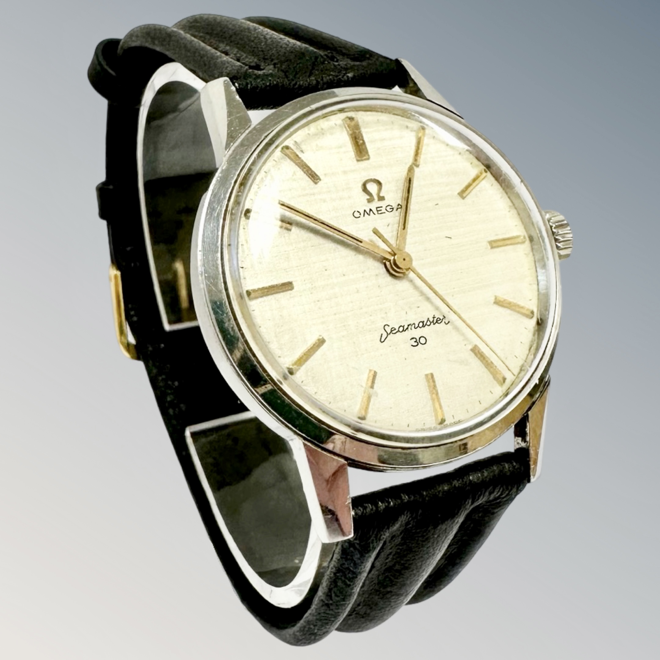 A scarce gent's stainless steel Omega Seamaster 30 wristwatch, with ridged and serrated cream dial,