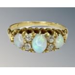 An antique 18ct gold opal and diamond ring, size N.