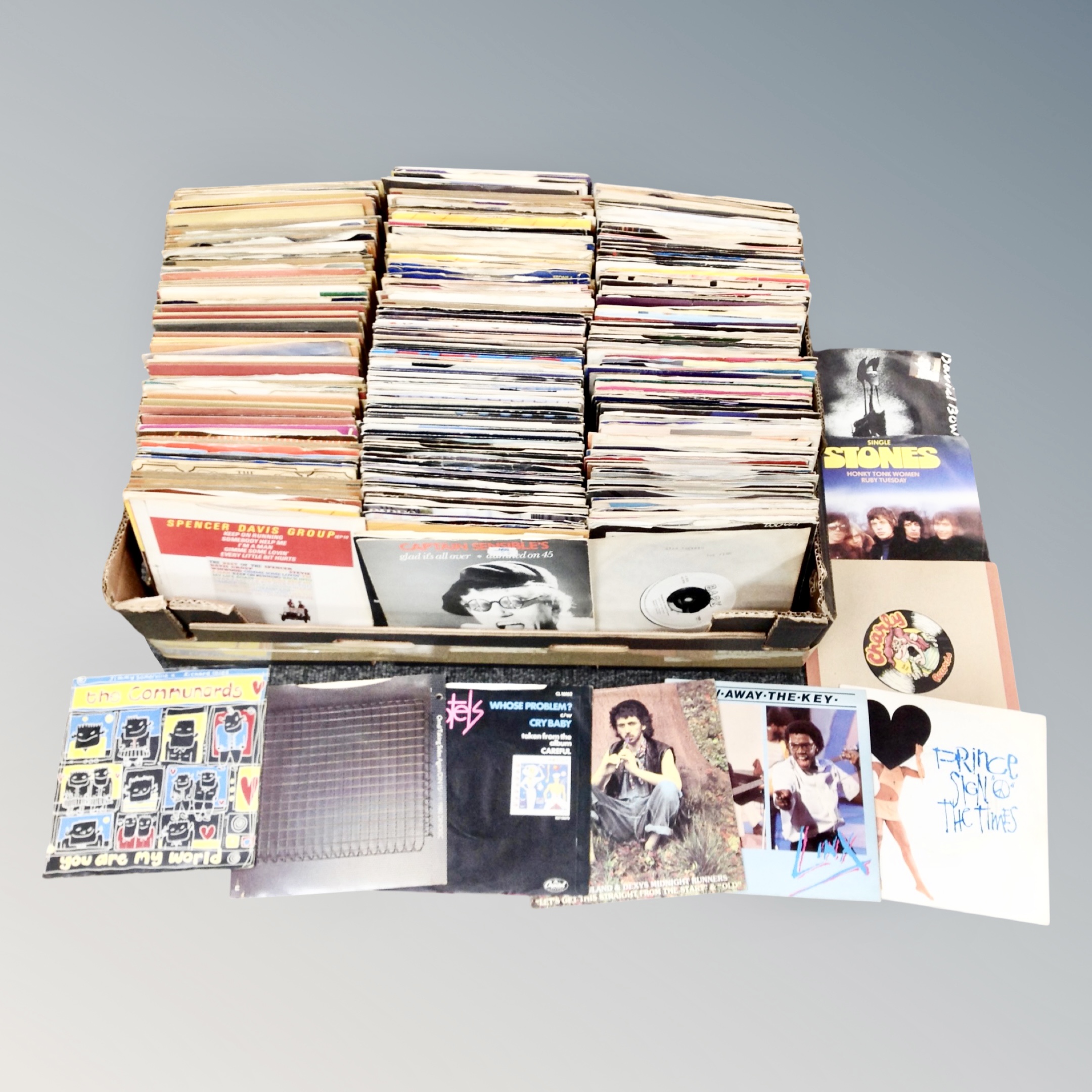 A box of large quantity of mid 20th century and later vinyl 7" singles to include Prince, OMD,