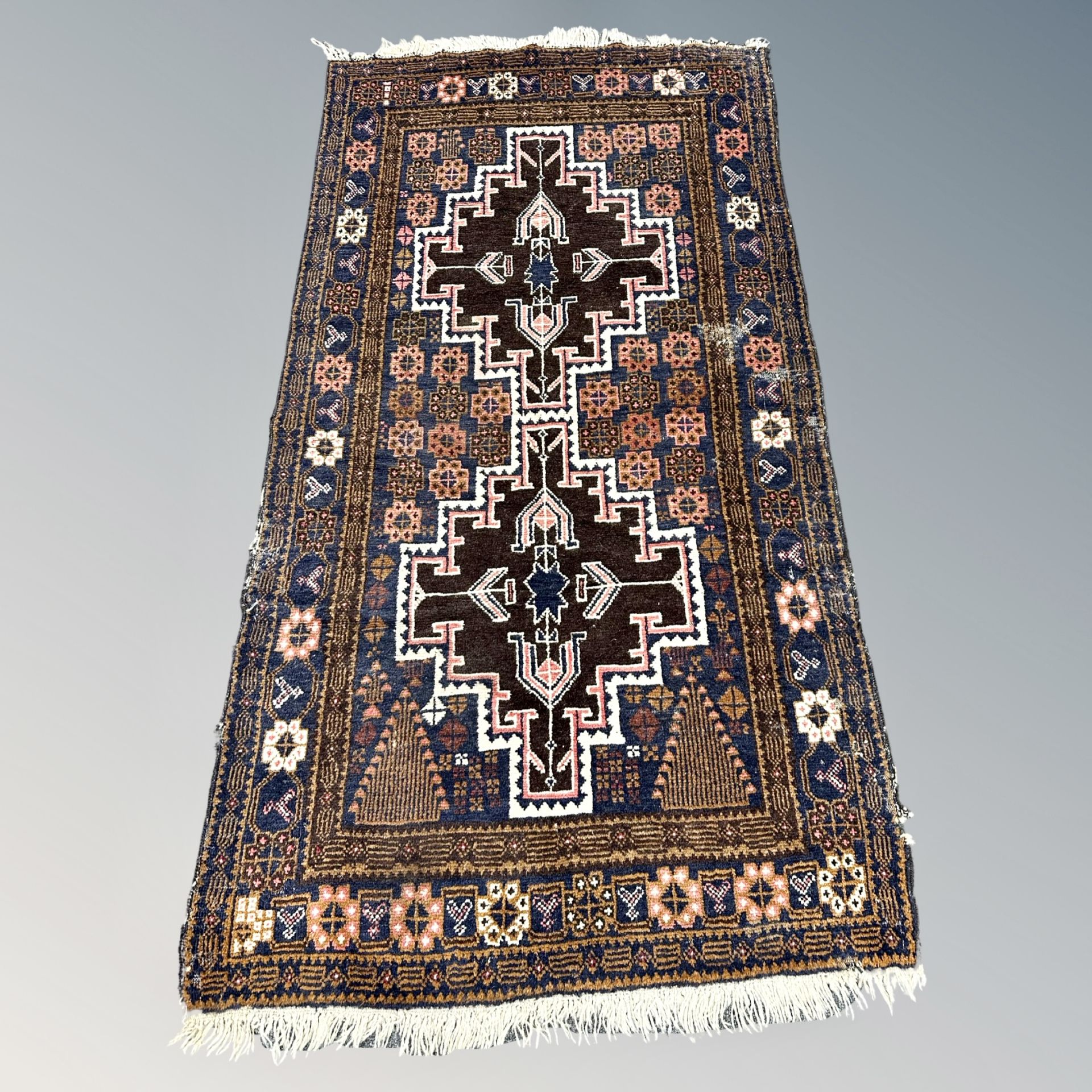 An antique Afghan/Caucasian rug, circa 1900,