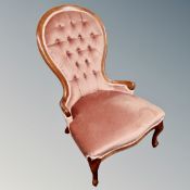 A Victorian style nursing chair in pink dralon