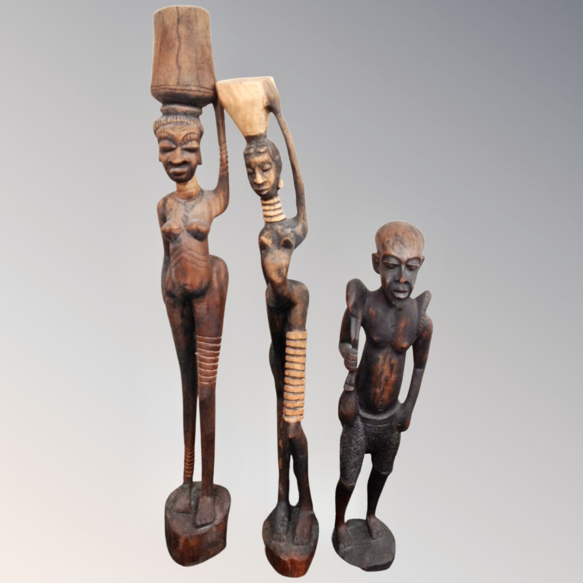 Three Gambian carved wooden figures