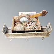 An antique brass fretwork fire curb on paw feet, a box of oak banjo barometer, tin sign,