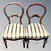 A pair of Victorian balloon back chairs in Regency stripe fabric