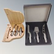 A three piece cheese knife set in box,