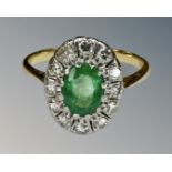 An antique 18ct gold emerald and diamond cluster ring, size O.