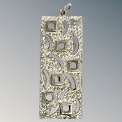 A silver pendant