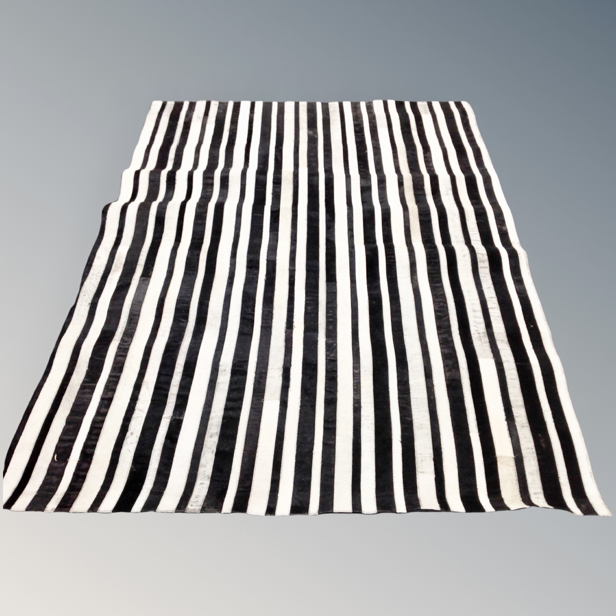 A black and white Zebra striped rug 173 cm x 237 cm