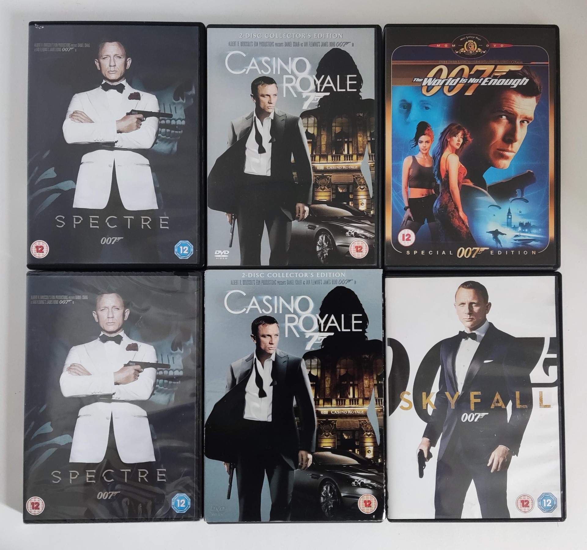 James Bond 50ml sealed seven perfume, DVD's and a Bush 20 inch TV with remote. - Image 2 of 3