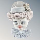 A Lladro bust of a clown no.