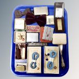 A tray of Ensign, Colibri and other pocket lighters, cigarette cases, bow ties,