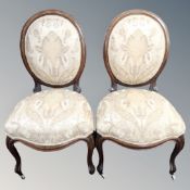 A pair of antique mahogany salon chairs