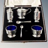 A silver cruet set in fitted box, Birmingham 1933 CONDITION REPORT: Good condition,