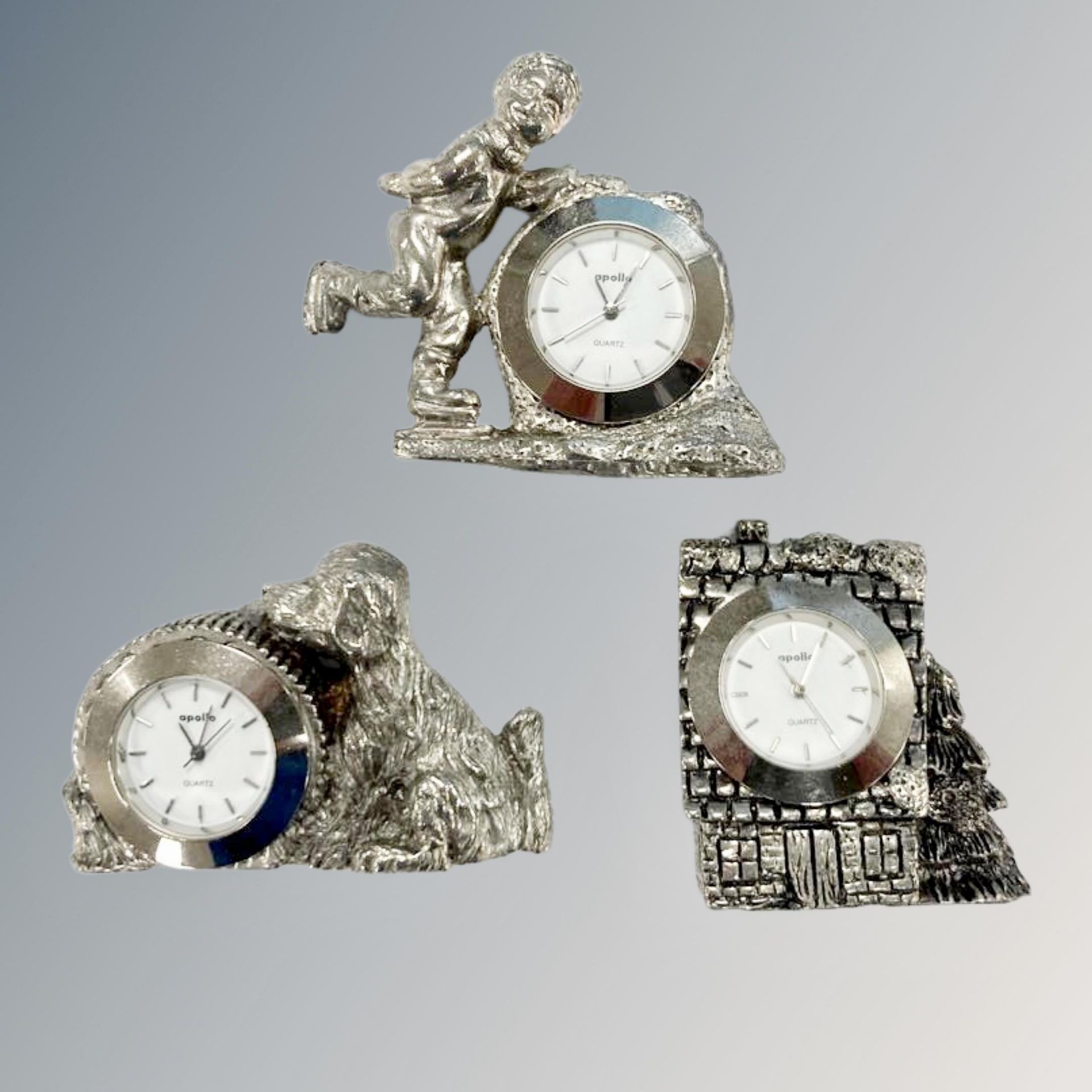 Three miniature clocks